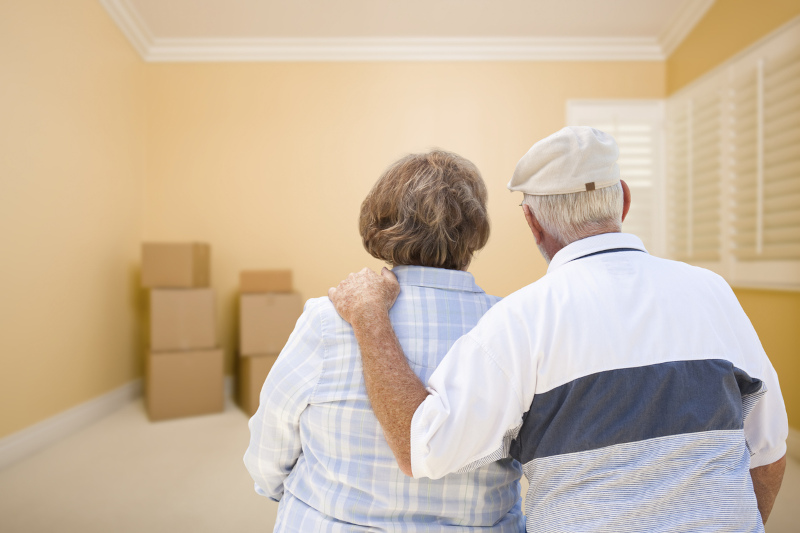 retired couple looking at storage space in new home